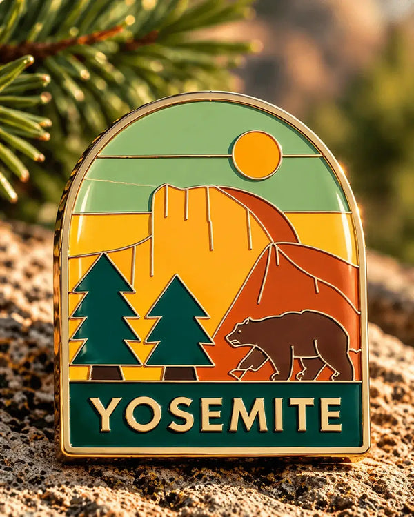 Close-up of a custom hard enamel pin with a smooth polished surface and level metal lines