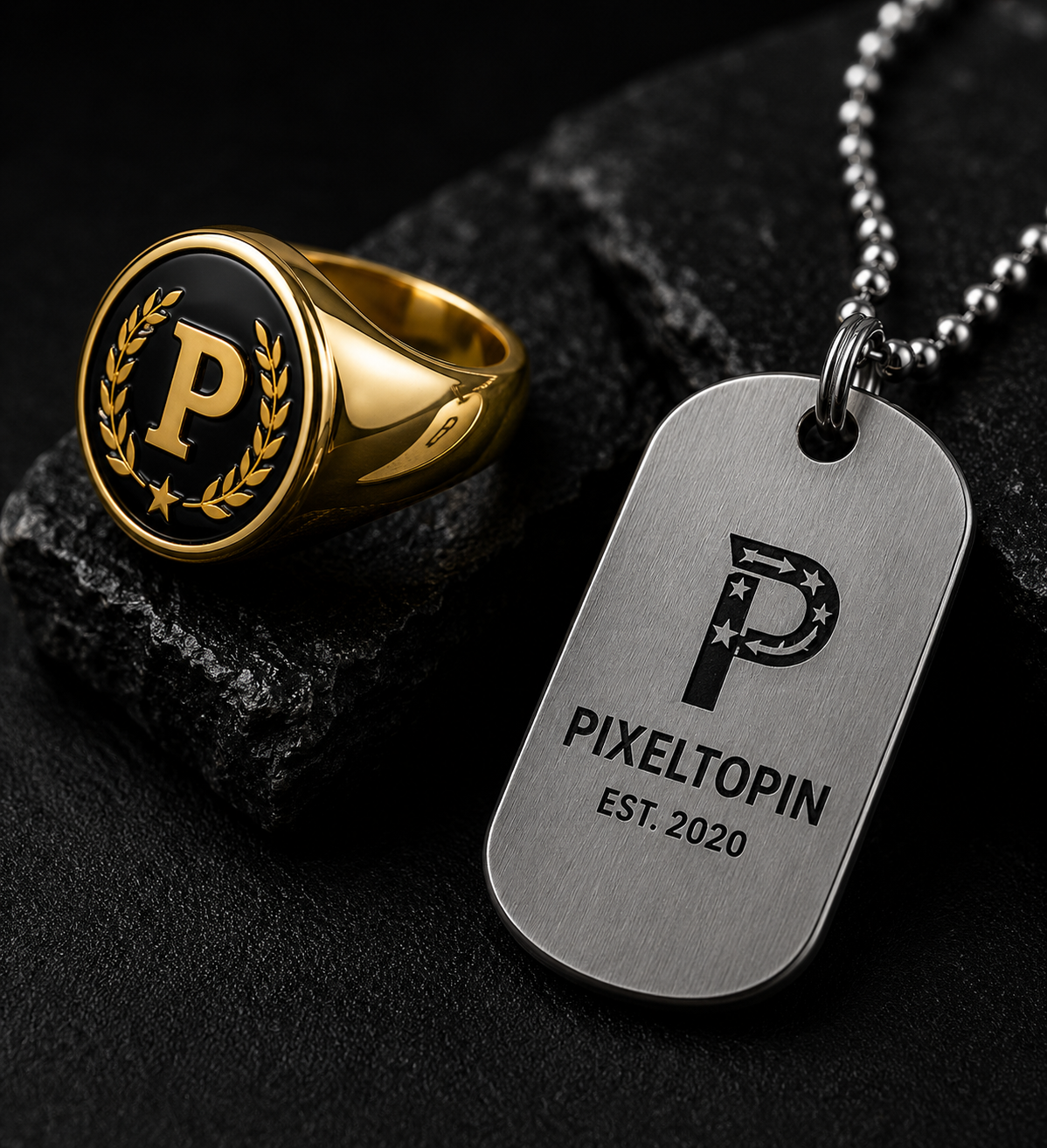 Custom gold signet ring and brushed silver metal tag with engraved details