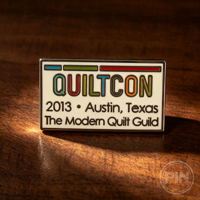 Custom hard enamel pin QuiltCon 2013 Austin Texas quilt guild design